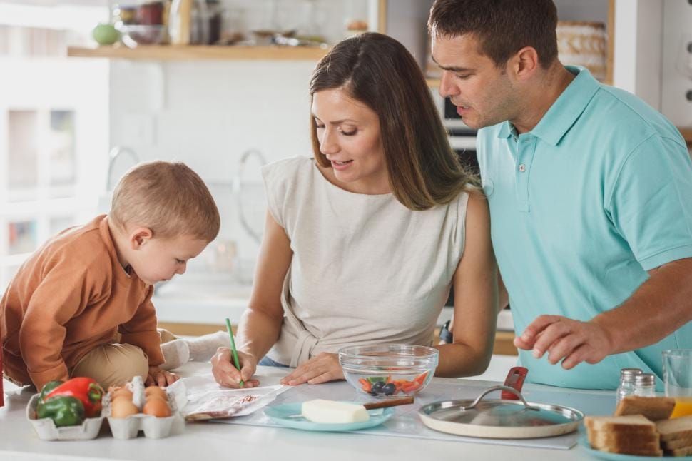 Family cooking a nourishing meal together in the kitchen